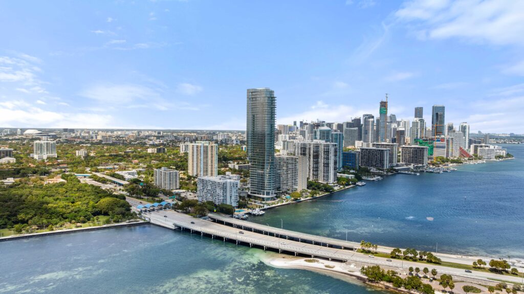 Aerial drone photography of Edgewater Miami and Biscayne Bay with the Downtown Miami skyline — Skyview Real Estate Media